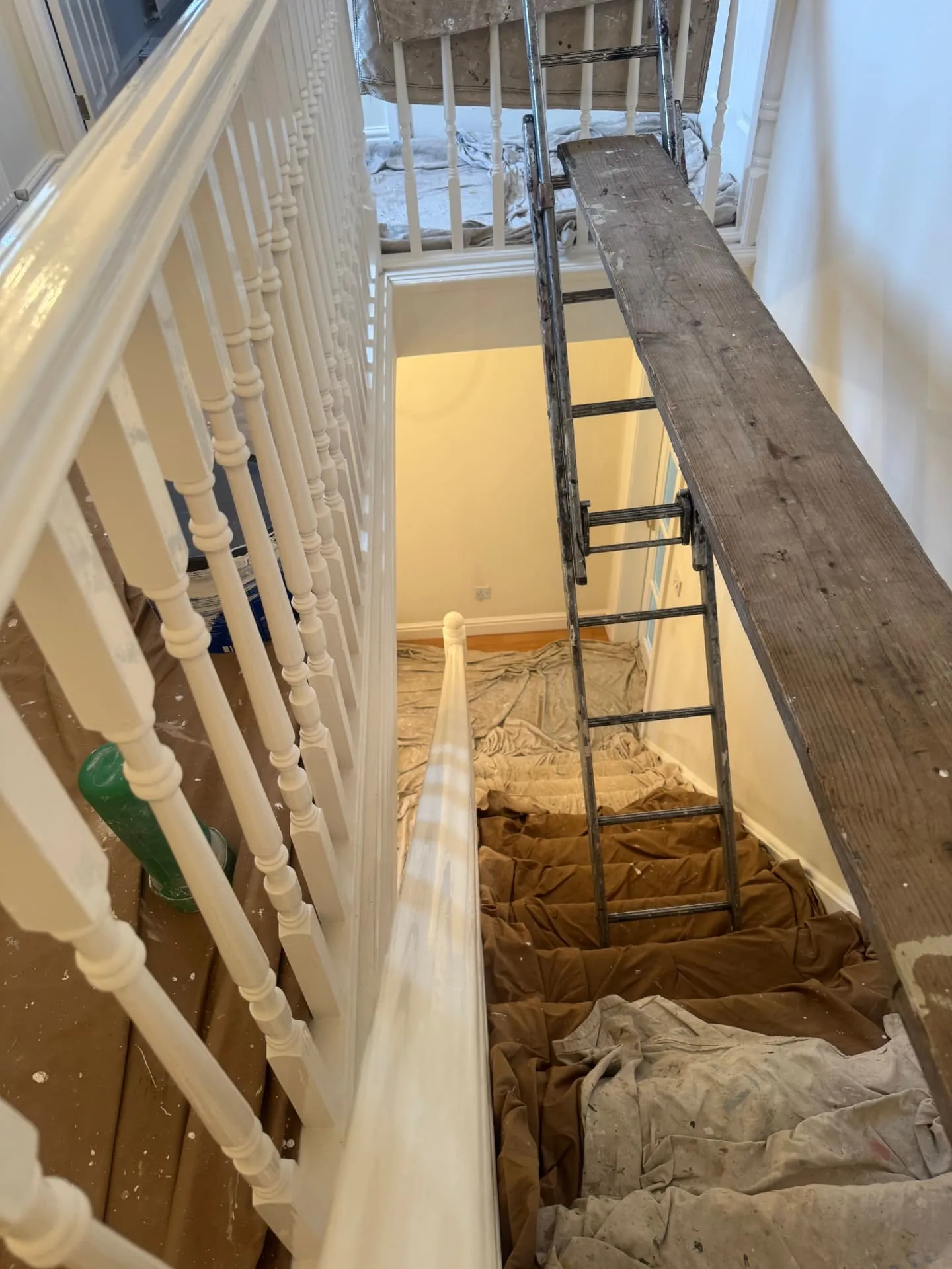 Stairs in a Midlothian home fully sheeted and protected by W J Crighton before painting starts
